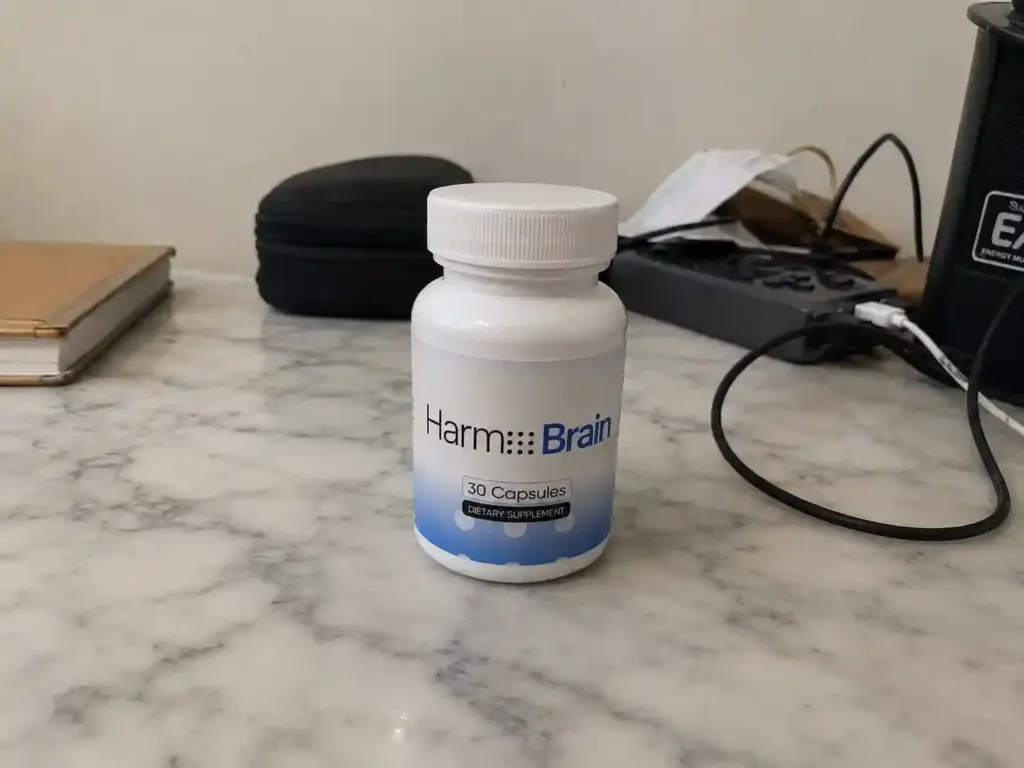 Harmo Brain brain supplement bottle on marble countertop
