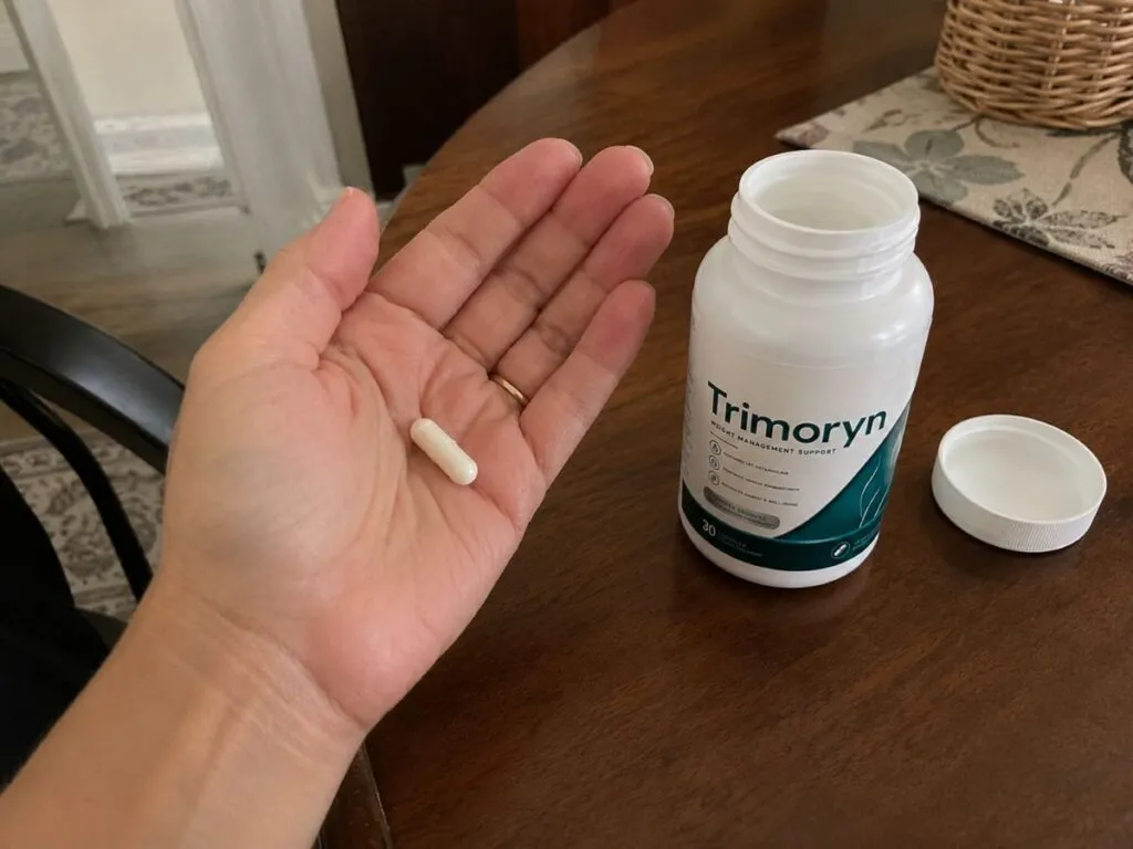 Taking a Trimoryn weight management capsule