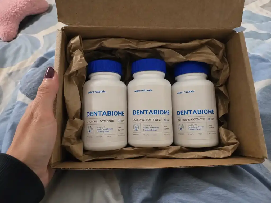 entaBiome official order with three oral health supplement bottles in a shipping box
