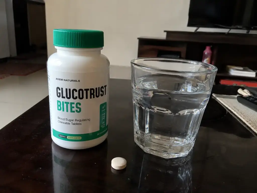 GlucoTrust Bites bottle with a glass of water
