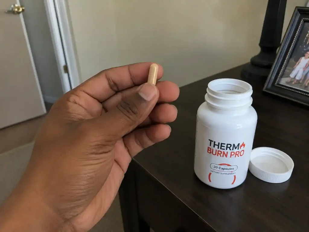 ThermoBurn Pro capsule with opened bottle.