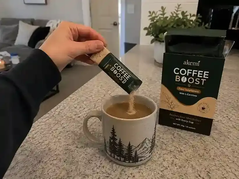 Akemi Coffee Boost metabolism support powder mixed with coffee.