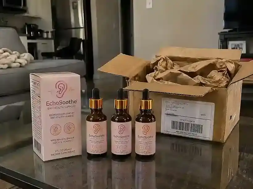 EchoSoothe ear health supplement bottles with opened shipping box and packaging