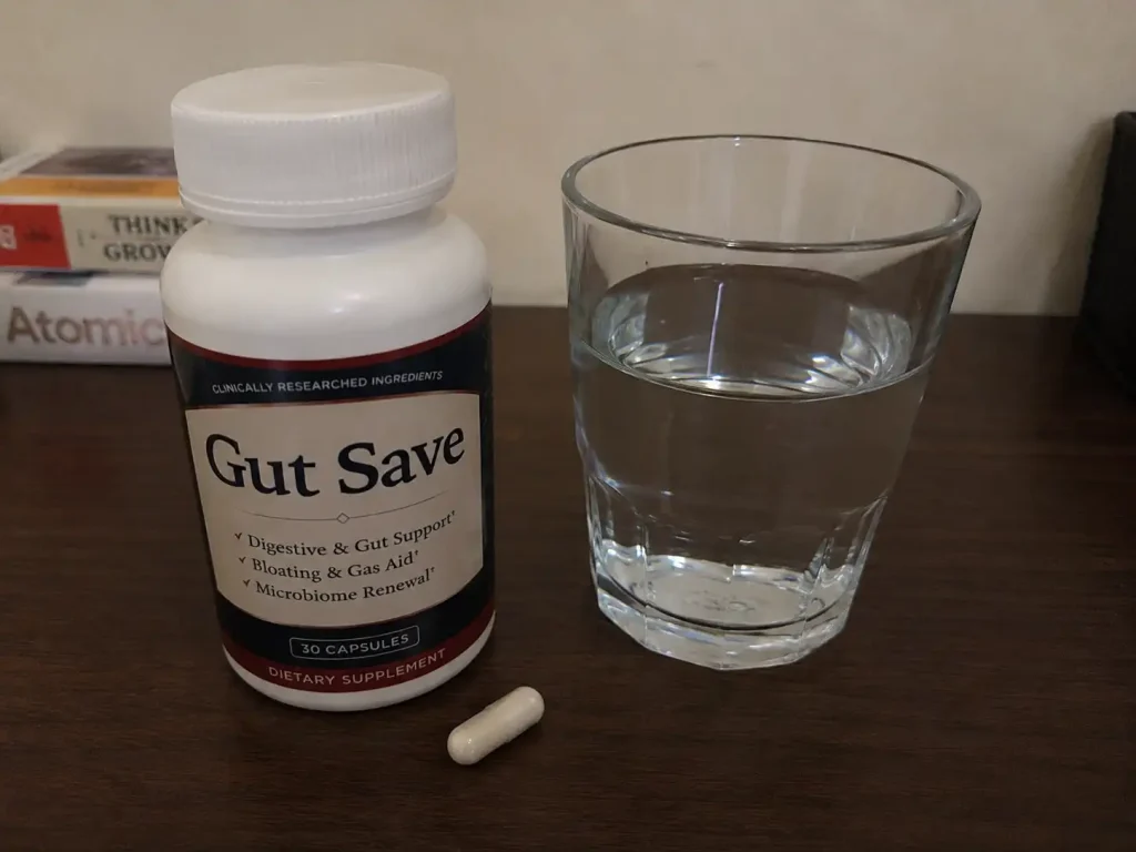 Gut Save bottle with water and capsule