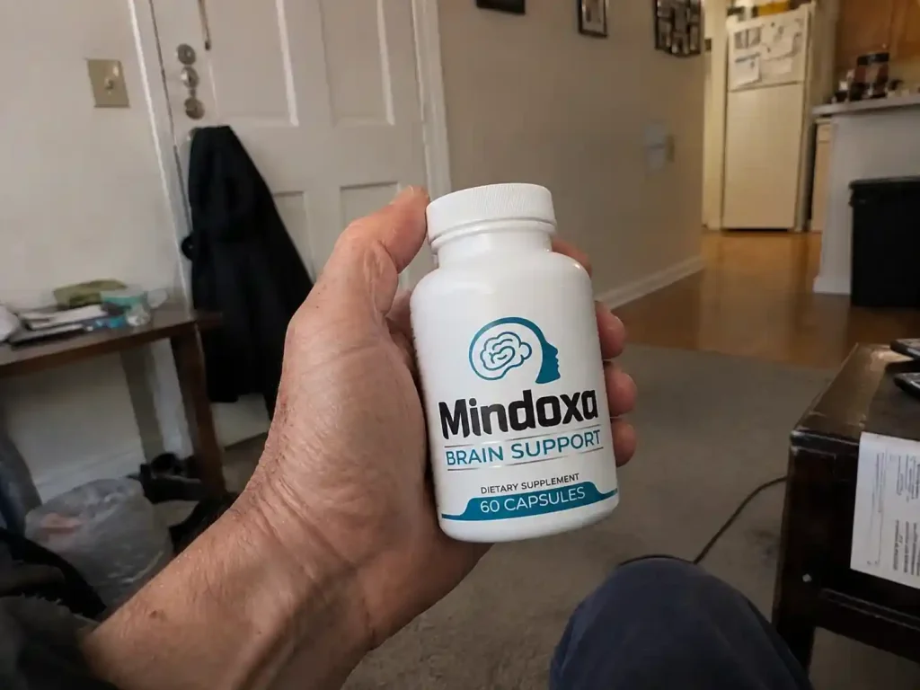 Mindoxa Brain Support bottle held in hand