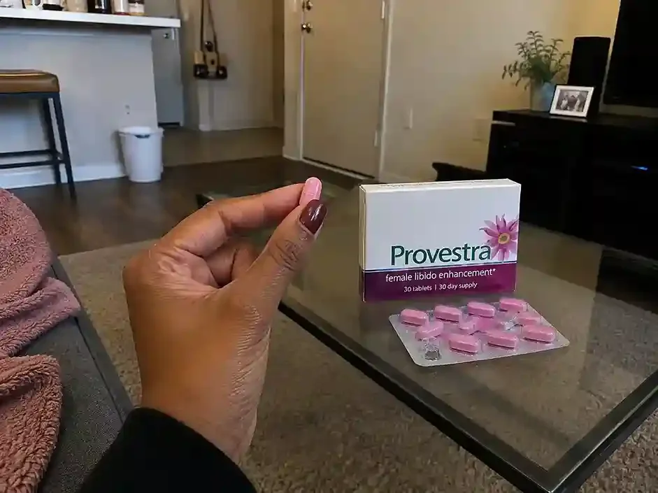 Provestra tablet held in hand