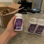 Three Slim Metrix supplement bottles