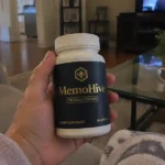 hand holding Memohive supplement bottle