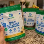 hand holding biotrust ageless muti collagen supplement bag