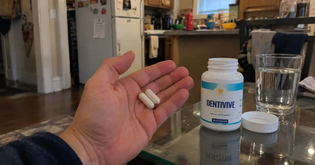 hand holding dentivive capsules