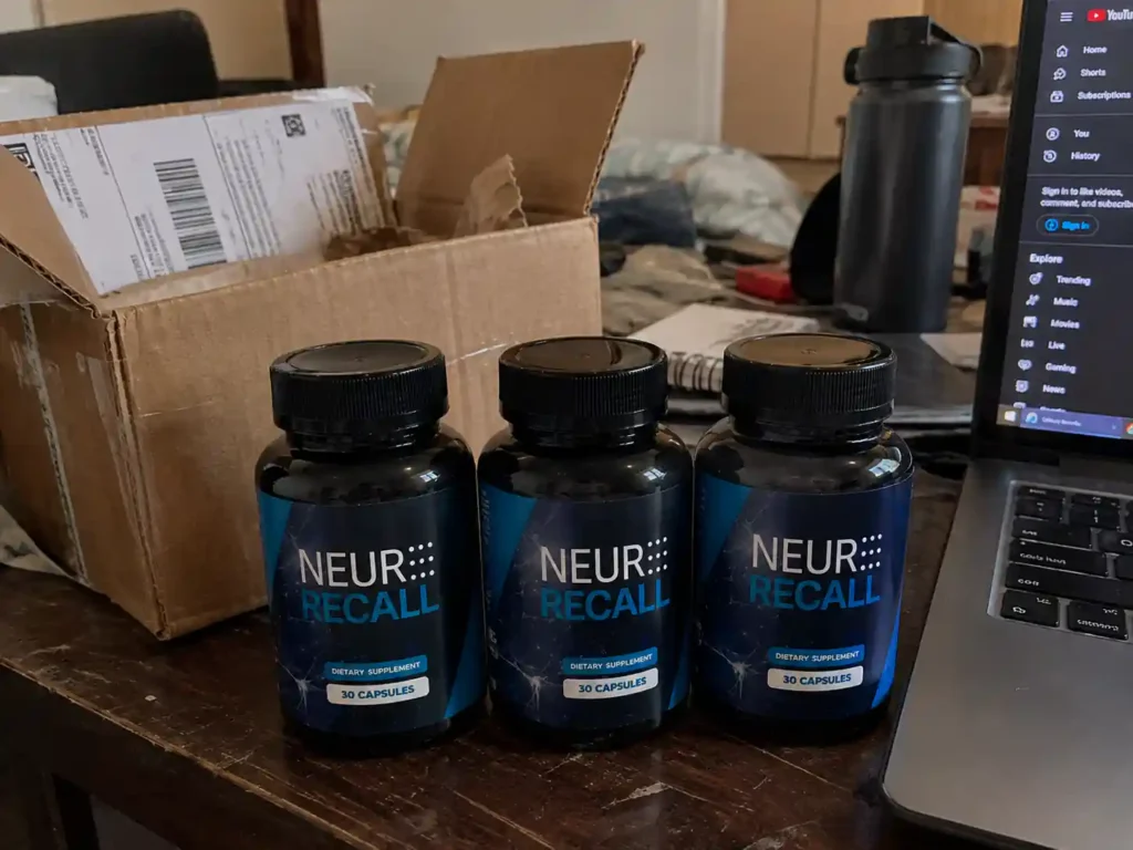 Neur Recall Bottles on a Cluttered Desk