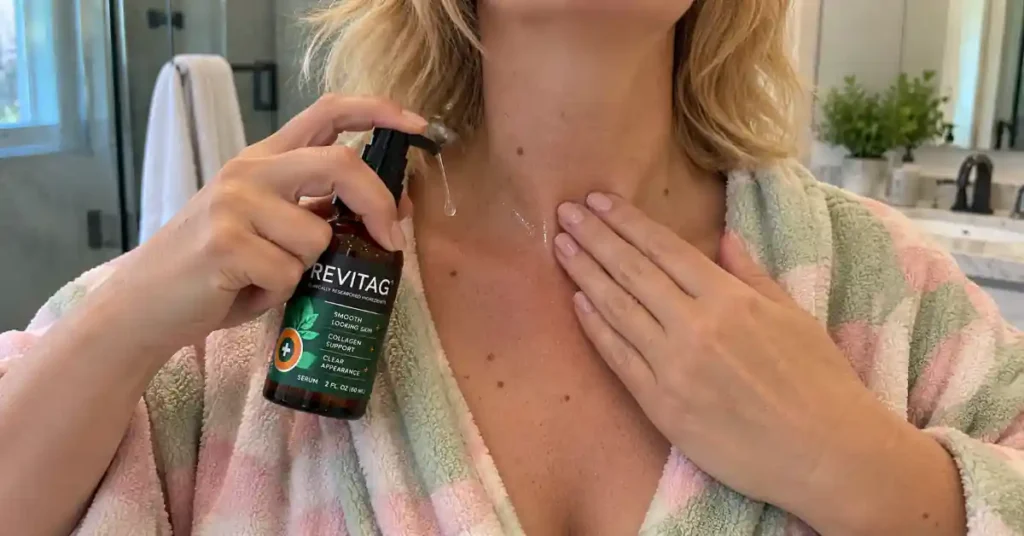 applying revitag skin tag serum on neck