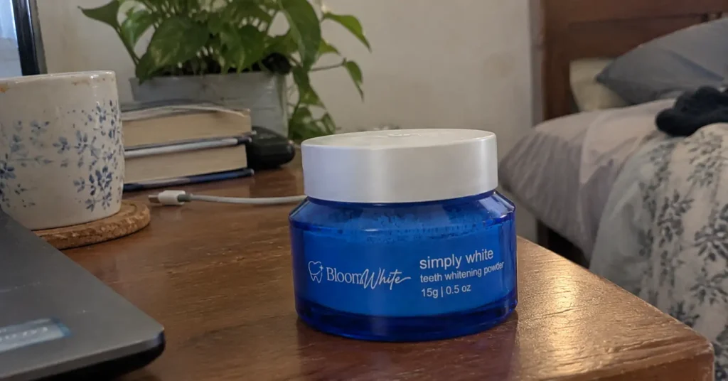 bloomwhite whitening powder in table
